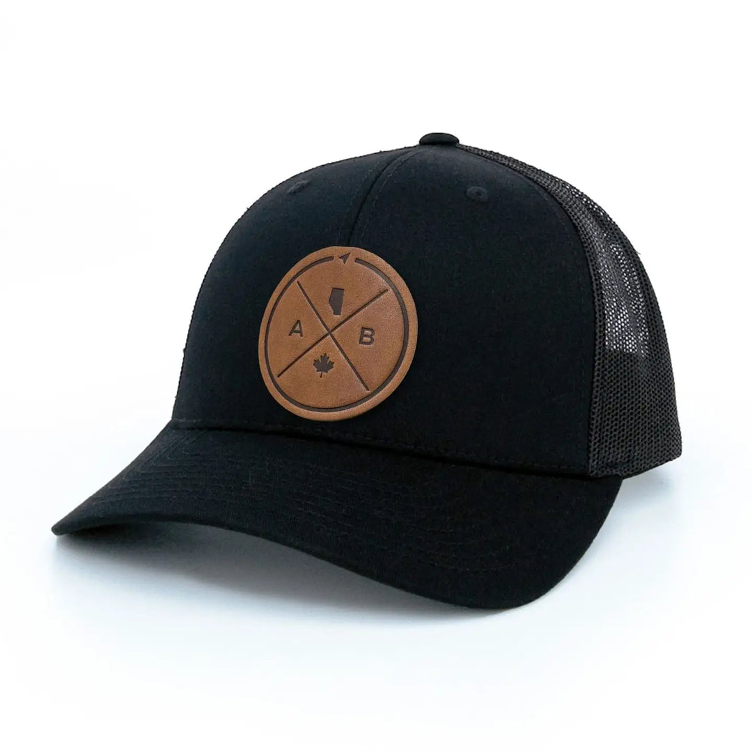 Alberta Compass Leather Patch Trucker Hat