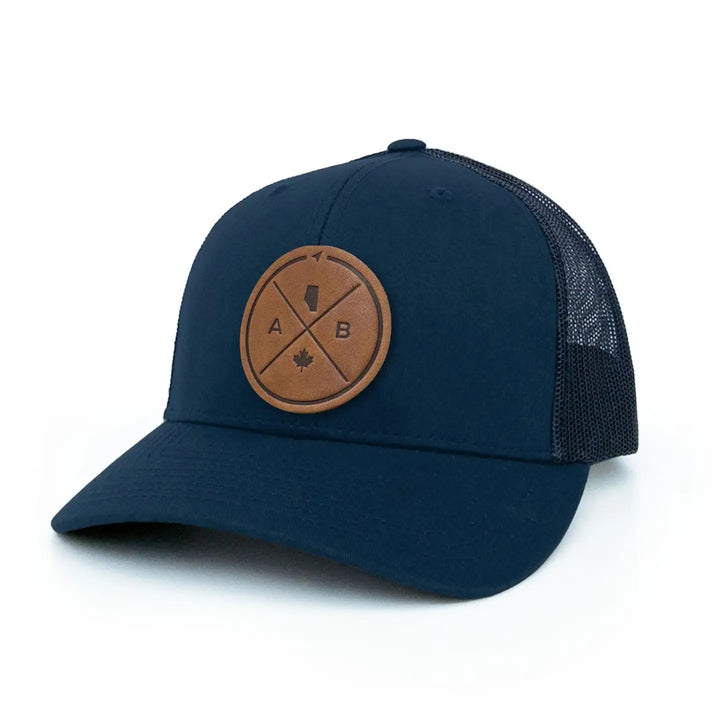 Alberta Compass Leather Patch Trucker Hat
